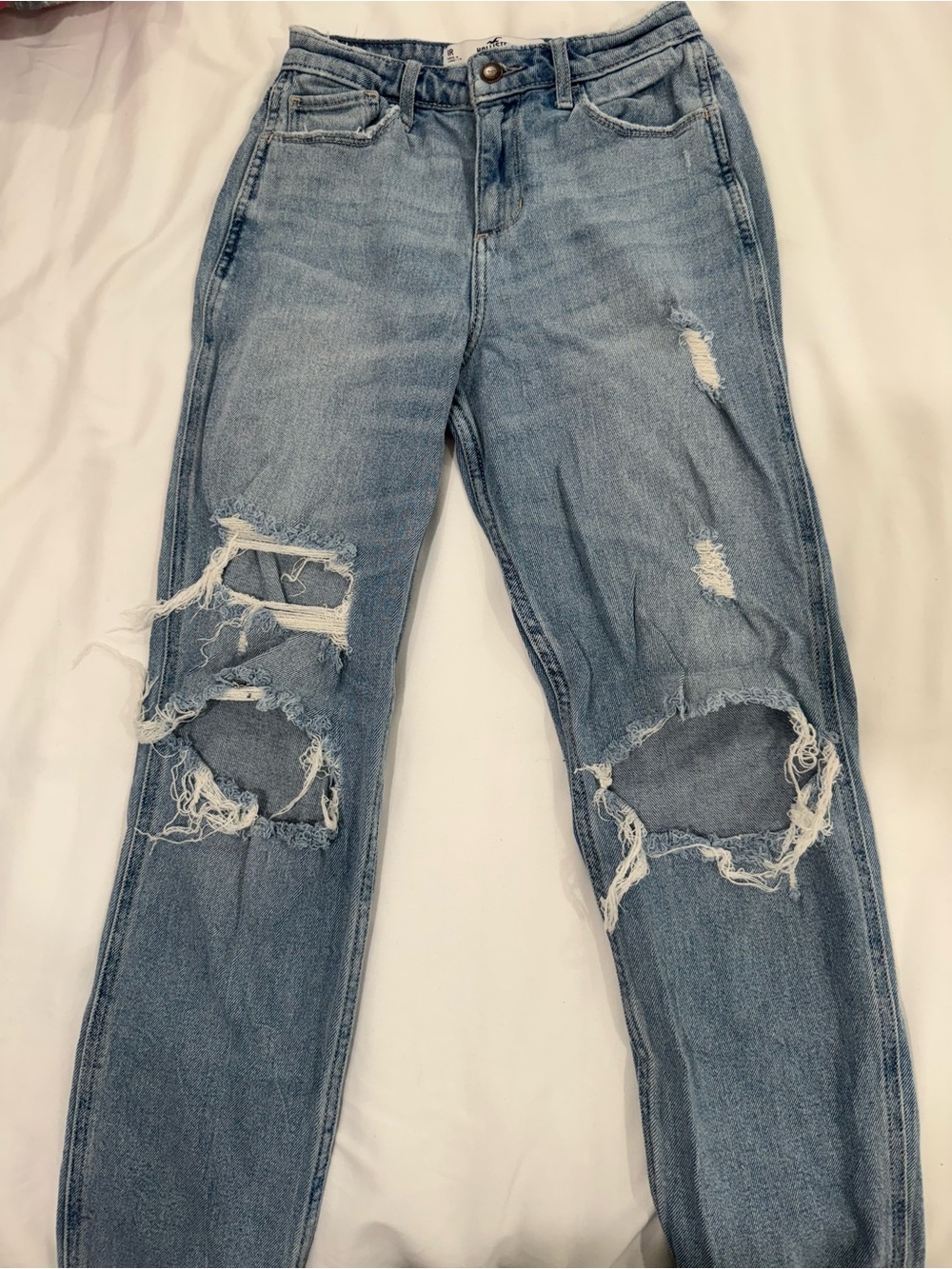 Hollister Light Blue Distressed Womenโs Jeans